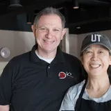 Phil Stevenson and Kazuyo inside K's Japanese Kitchen