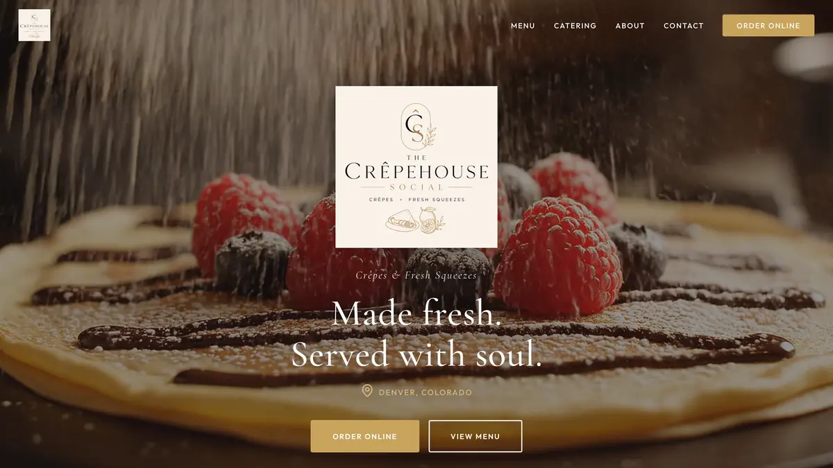 The Crêpehouse Social website on a laptop